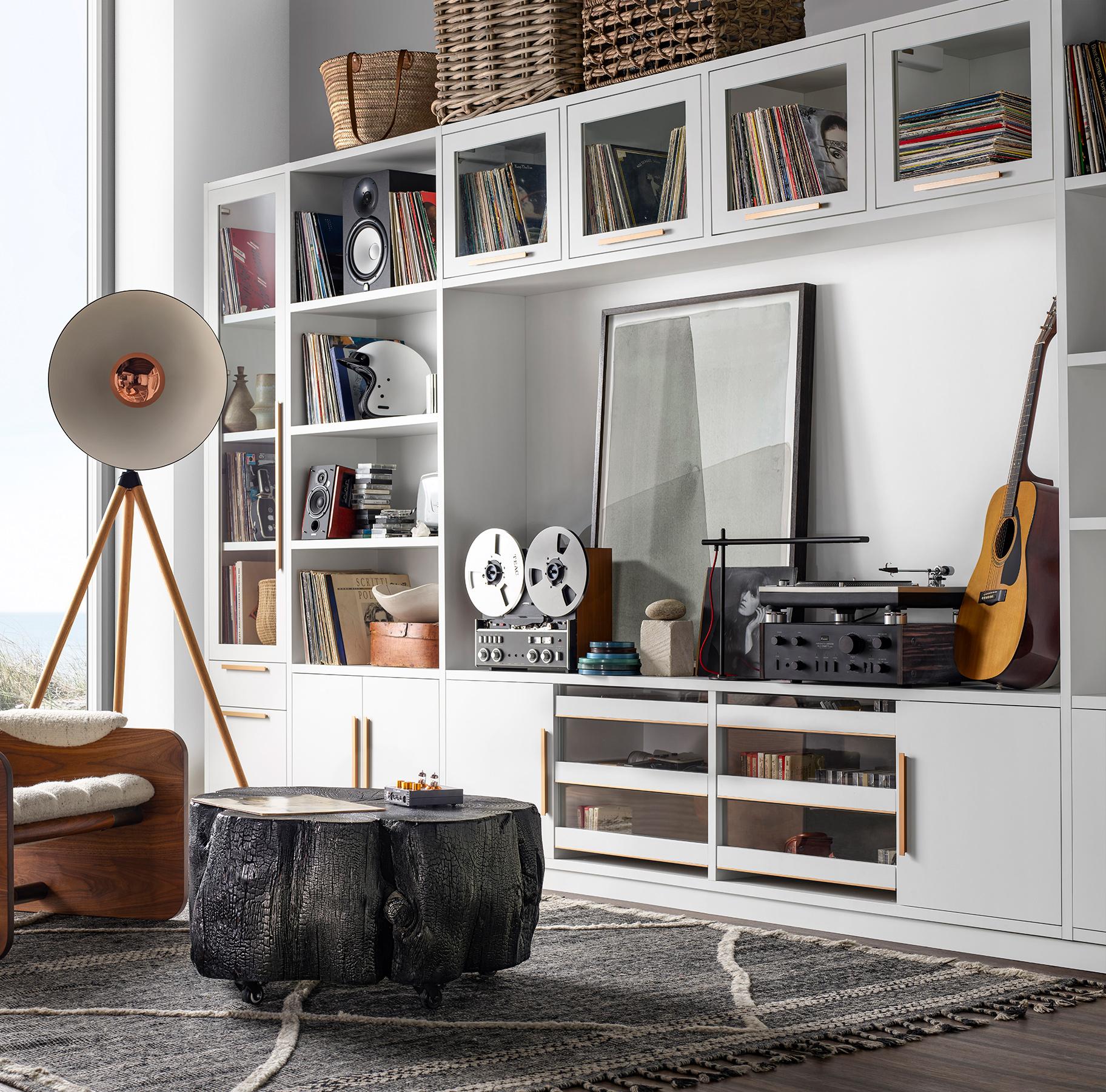 Family room area with media cabinet shown in a dove finish by California Closets