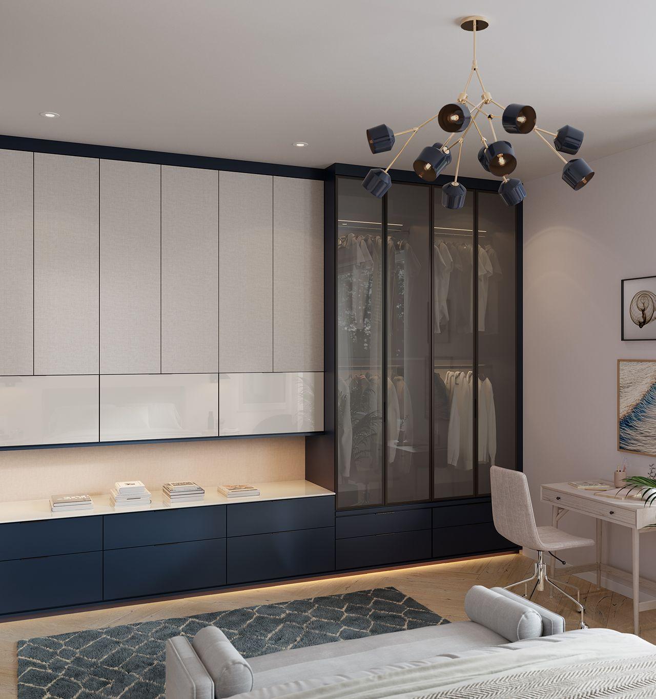 Wardrobe custom floating cabinets and tall clothing hanging space from California Closets
