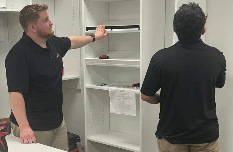 Installation projec checking the shelving in the custom solution from California Closets