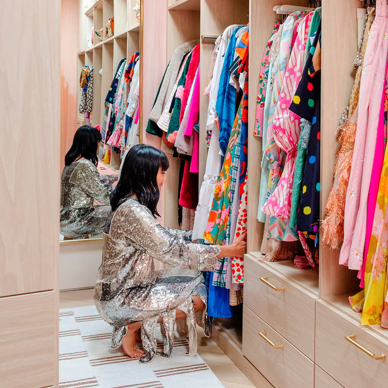 Walk in closet inspiration from California Closets Instagram featuring custom storage solutions