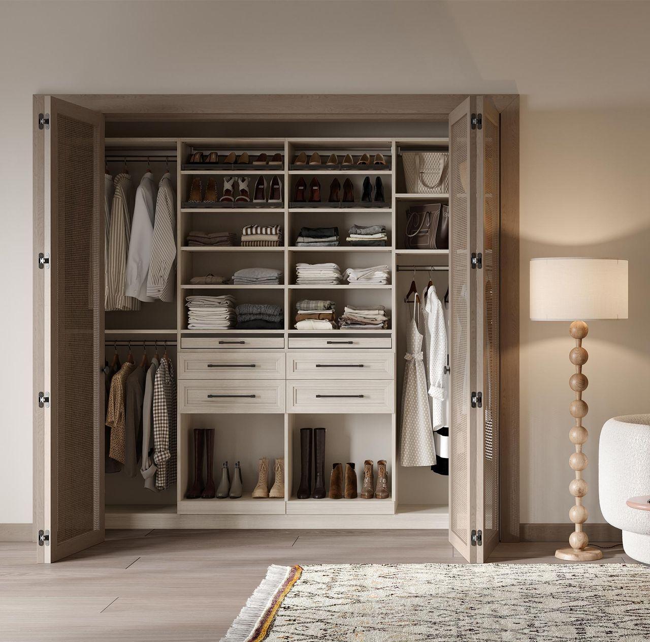 Light colored custom reach in closet storage designed by California Closets.