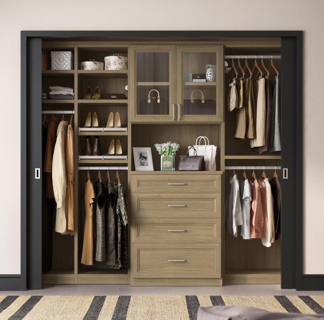 Reach In Closet with doors in a medium wood grain finish California Closets.