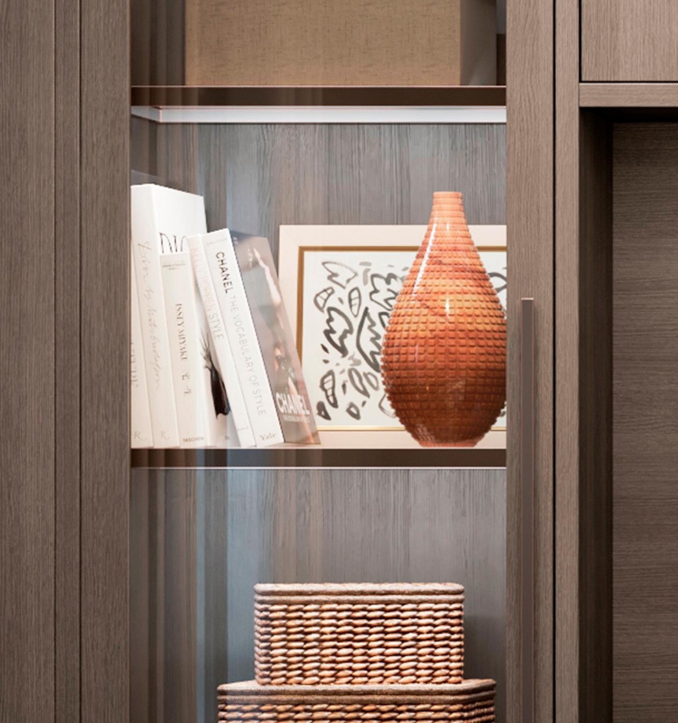 Lighted shelves for living room hutch storage system from California Closets