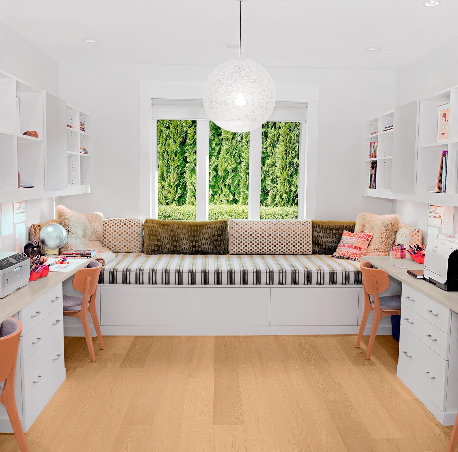 Custom family office designe with built in desk and extra counter space created by California Closets.