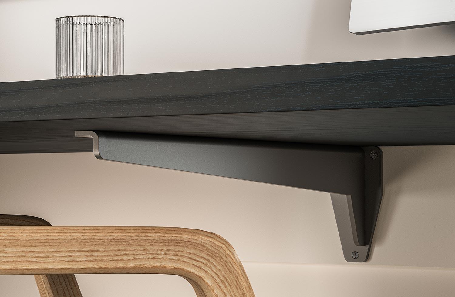 Office desk with hardware brackets to bolster the weight of the custom buildout by California Closets 