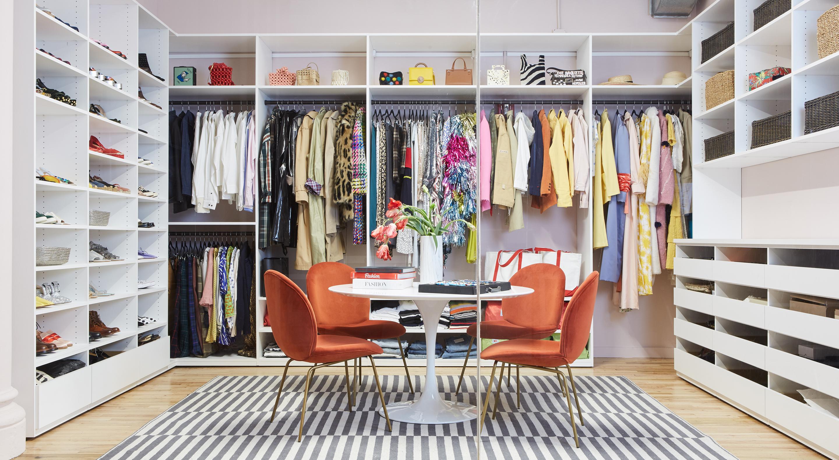 Design for a clothing showroom created with custom clothes rods, shelving system and closet office storage by California Closets
